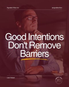 A professional sits thoughtfully at a desk with one hand resting under their chin, looking at the monitor. Large white text reads "Good Intentions Don't Remove Barriers," with a yellow underline beneath the title. SignAble Vi5ion Inc. branding appears at the top, Leah Riddell's name is shown at the bottom left, and the SignAble Vi5ion logo is displayed in the bottom right.